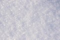 White fluffy snow and snowflakes glistening in the sun Royalty Free Stock Photo