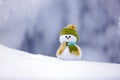 On the white fluffy textured snow alone snowman. Royalty Free Stock Photo