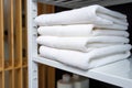 a white fluffy towel on a sanitarily cleaned rack Royalty Free Stock Photo