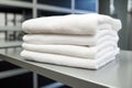 a white fluffy towel on a sanitarily cleaned rack Royalty Free Stock Photo