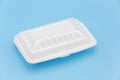 White foam box isolated on blue background Royalty Free Stock Photo