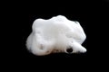 White foam bubble soap, cleanser or shampoo isolated on black background Royalty Free Stock Photo