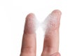 White foam bubbles texture with child finger and hand isolated Royalty Free Stock Photo