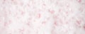 White foam bubbles texture on pink pastel background, copy space, banner for loundry, cleaning service, bathroom concept, clean, Royalty Free Stock Photo