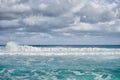 White foamy waves and gradually darkening color of sea water Royalty Free Stock Photo