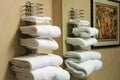 White folded bathroom towels on a rack Royalty Free Stock Photo