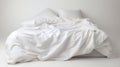 White folded duvet lying on white bed background. Preparing for household, domestic activities, hotel or home textile, white Royalty Free Stock Photo