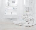 White folded spa towels on defocused interior background of bathroom Royalty Free Stock Photo