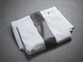 White folded t-shirt with blank label Royalty Free Stock Photo