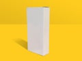 White Folding Cartons Isolated On Yellow Color Background.  Straight Tuck End. Paperboard Boxes Front Corner Side View. Vertical Royalty Free Stock Photo