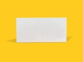 White Folding Cartons Isolated On Yellow Color Background.  Straight Tuck End. Paperboard Boxes Front View. Horizontal Position. Royalty Free Stock Photo