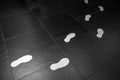 White footprints on a black floor