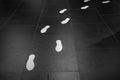 White footprints on a black floor