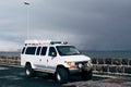 Reykjavik, Iceland - 02 may 2019: A white Ford Econoline van on huge wheels, with sirens and flashing lights, parked on