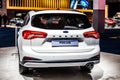 White Ford Focus station wagon, Brussels Motor Show,  4th gen, compact car produced by American automaker Ford Motor Royalty Free Stock Photo