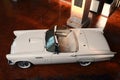 White Ford Thunderbird 1957 in an in an exhibition hall