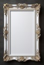 A white frame with gold trim sits on a black background Royalty Free Stock Photo