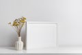 White frame mockup in white minimalistic room with copy space for artwork, photo or print presentation Royalty Free Stock Photo