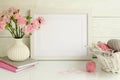 White frame mockup with pink carnations