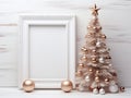 white frame with small golden christmas tree on white background