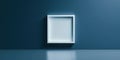 A white frame is standing in front of a blue wall Royalty Free Stock Photo