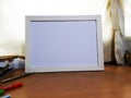White Frame On The Study Oak Table Position 5 Royalty Free Stock Photo