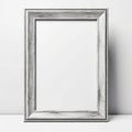 Vintage Poster Design: Dark Silver And White Empty Frame On A Rustic Realism Wall