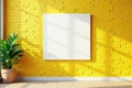 White framed canvas on textured yellow brick wall Studio shot , gallery, yellow, orange Royalty Free Stock Photo