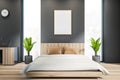 White framed poster on wall, wood bedroom modern interior and home office table with panoramic window, comfortable bed. Concept of Royalty Free Stock Photo