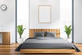 White framed poster on wall, wood bedroom modern interior and home office table with panoramic window, comfortable bed. Concept of Royalty Free Stock Photo