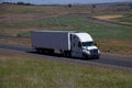 White Freightliner Semi-Truck / White Trailer