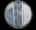 White front bicycle reflector Royalty Free Stock Photo