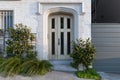 White front door of a classic house in the suburbs Royalty Free Stock Photo