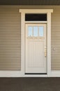 White front door on an upscale home.