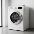White Front- Loading Washing Machine with Digital Display in a Room washer appliance Royalty Free Stock Photo