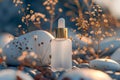 White frosted glass dropper bottle with golden cap, surrounded by stones and dried flowers. Beauty product, concept of natural