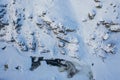 White frozen forest and river in winter. Aerial view of nature in Ural, Russia