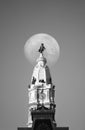 White full moon behind William Penn statue on Philadelphia City Hall in Philadelphia, Pennsylvania Royalty Free Stock Photo