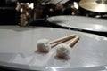 White fur mallets on timpani drum Royalty Free Stock Photo