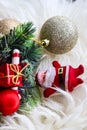 Sparkly and shiny christmas tree ornament and santa claus. Golden christmas bells and christmas tree on the background.