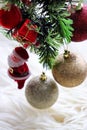 Sparkly and shiny christmas tree ornament and santa claus. Golden christmas bells and christmas tree on the background.