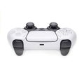 A white gamepad with black buttons and a black and white logo Royalty Free Stock Photo