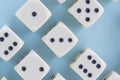 White gaming dices on light blue background. victory chance and lucky. Flat lay style, place for text. Top view and Close-up cube