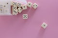White gaming dices on violet background. victory chance and lucky. Flat lay style, place for text. Top view and Close-up cube.