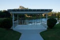 A white garden house / gazebo / arbour overlooking a pond in Queensland, Australia Royalty Free Stock Photo