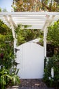 White gate and pergola Royalty Free Stock Photo