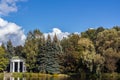 White gazebo on the background of trees Royalty Free Stock Photo