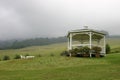White gazebo on hillside Royalty Free Stock Photo