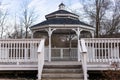 White gazebo with steps and fence Royalty Free Stock Photo