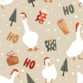 White geese in Santa Claus helper hats, gift boxes, and ho-ho-ho lettering seamless pattern. Funny and cute Xmas geese Royalty Free Stock Photo